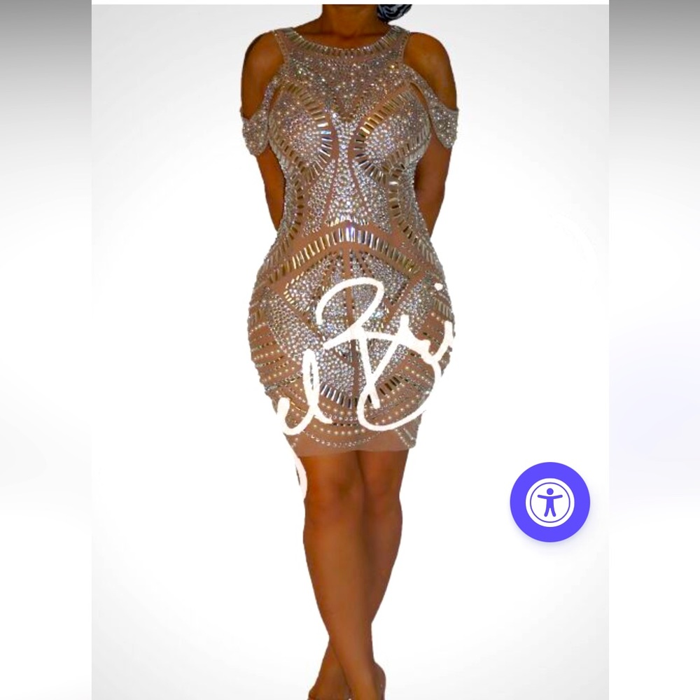 Brand New sheer nude dress with rhinestones size 10-12. RUNS SMALL